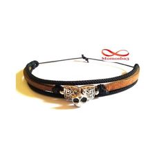 Bracelet Tête de Mort Cuir MARRON + Cordon Noir (Fil Réglable) au meilleur prix au Maroc