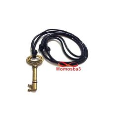 Collier Clé (Suerte/Felicidad) BRONZE Fil Réglable - Unisex au meilleur prix au Maroc