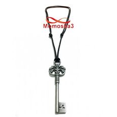 Collier Fil Noir Réglable Avec Pendentif Clé BRONZE Argenté - Unisex au meilleur prix au Maroc